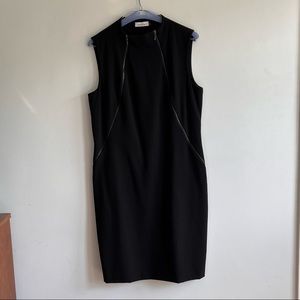 Calvin Klein Black Sleeveless Sheath with diagonal zipper accents. Size 12